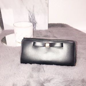 Kate Spade Montford Park Nisha zip leather wallet